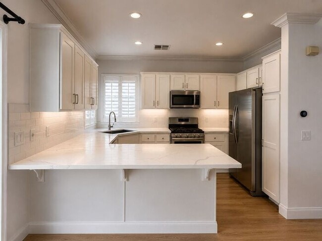 Photo - Nestled in the Natural Beauty of Plum Canyon, This Beautiful Home Offers the Perfect Blend of Tra...
