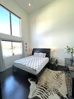 Primary bedroom 24ft ceilings - 1422 Hi Point St Townhome