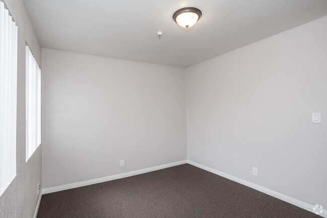 2BR, 2BA - 900SF - First Bedroom - Emerald Terrace Apartments