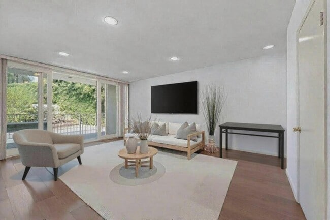 Living Room Staged - 691 Levering Ave Apartments
