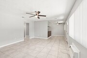 2BR, 2BA - 900SF - Living Room - Spanish Oaks