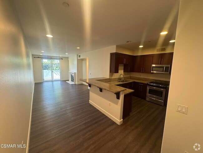 Building Photo - 14412 Killion St Unit 102 Rental