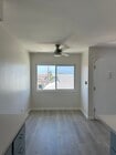 Dining area looking west from kitchen - 21104 Donora Ave Unit C