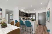 Kitchen with Countertop Bar and Energy-Efficient Appliances - Selby Venti by Wiseman