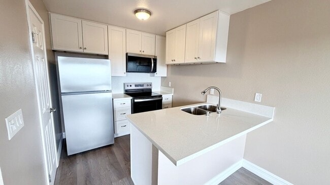Photo - Bright 2BR Bay Park Townhome with Covered Parking & Canyon View Balcony