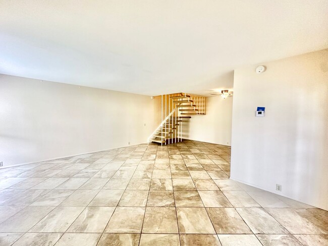 Photo - Spacious Condo with A Large Patio and Upstiars Balcony! Parking and Water Included!
