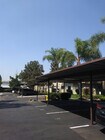 Asigned covered parking at Teton Pines Apartments in Escondido, California. - Teton Pines Apartments