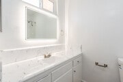 2BR, 2BA - 890SF - Primary Bathroom - 1600 W. 5th St. Apartments