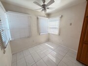 Photo - Charming 2 Bed Home with A/C, 2 Car Garage, Huge Yard & In-Unit Laundry