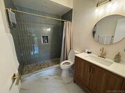Photo - Studio rental available in a beautifully renovated single-story ranch property located in the hig... Unit 1/2