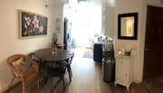 The eating area is situated between the family room nd kitchen. - 23705 Sea Breeze Ln Condo Unit 23705