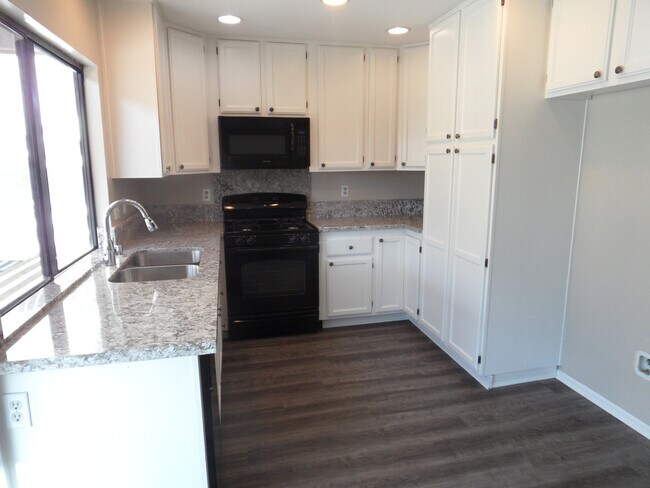 Photo - Two Story 4 BR 2.5 BA Condo With 2 Car Garage Unit 3