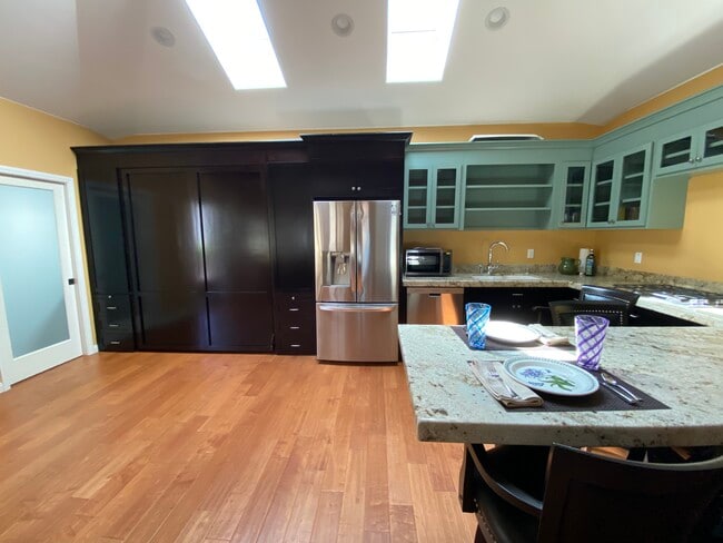 Murphy bed to maximize living space. - 10563 Cushdon Ave Unit ADU