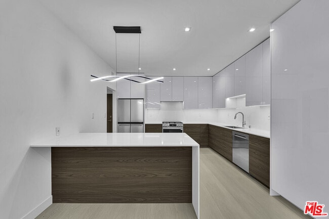 Photo - 10630 Wilkins Ave Unit 204