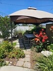 Shared outdoor dining area - 3911 Woolwine Dr Apartments Unit B