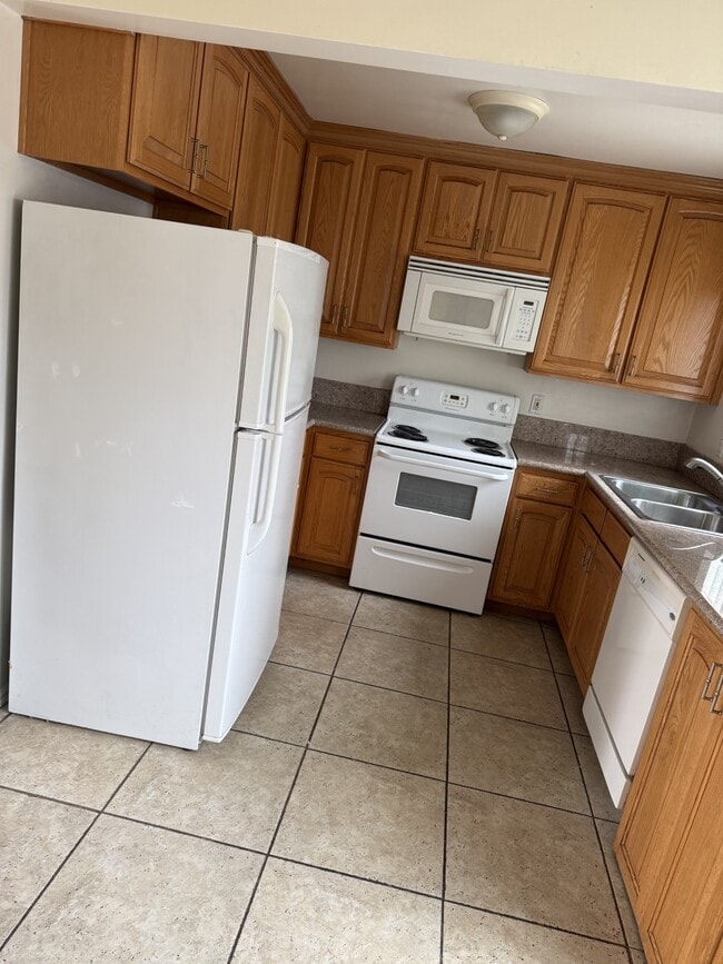 Building Photo - 21104 Ladeene Ave Unit #B