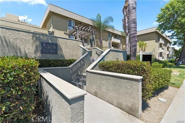 Building Photo - 5009 Woodman Ave Unit 116