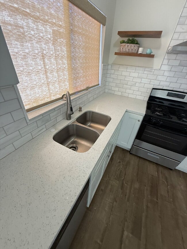 Photo - Solar savings on energy. 3rd bonus room. 2 Car Garage, Private Yard, Spacious upgraded interior...