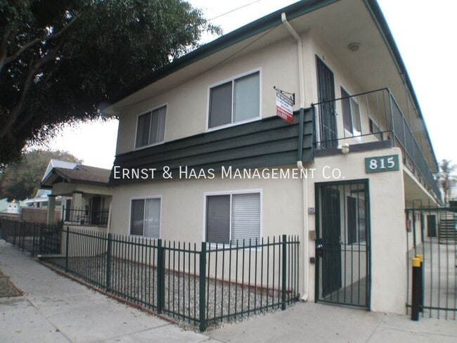 Building Photo - 815 E 9th St Unit #07