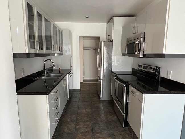Kitchen to Hallway - 7300 Franklin Ave Condo Unit 552