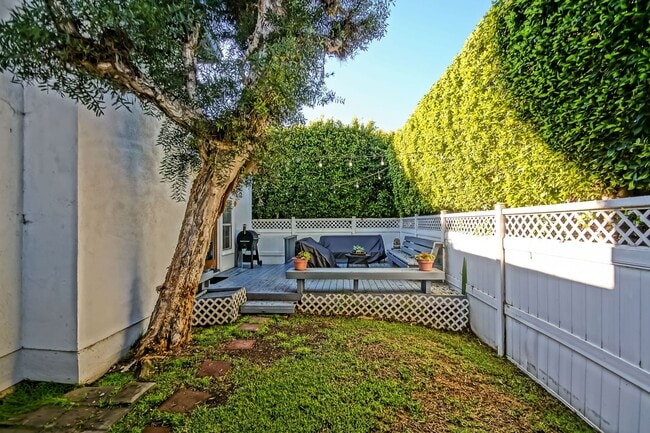 Photo - CHARMING & SPACIOUS, 5BR3.5BA HOME W/ PRIVATE YARD, BALCONY & SPRAWLING LIVING SPACE NEXT TO SAND...