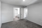2BR, 2BA - 1000SF - Primary Bedroom - Sand Castle Apartments
