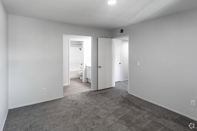 2BR, 2BA - 1000SF - Primary Bedroom - Sand Castle Apartments