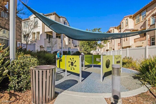 Photo - Stylish Three-Story Townhome with Private Courtyard & Pool Access