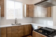 Brand new kitchen- Large sink, dishwasher, range, vent hood - 4772 Bancroft St Townhome