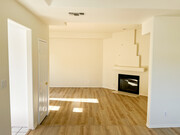 Large, sunny living room with fireplace - 10626 Valley Spring Ln Condo Unit 304