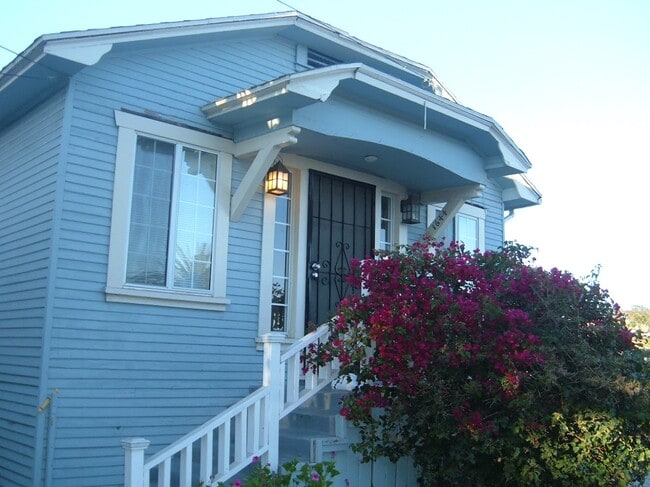 Earlier photo with Bouganvilla - 1644 Mohawk St House