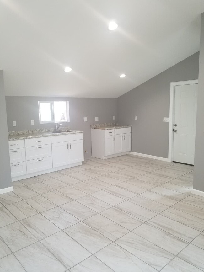 Building Photo - 7514 Garden Grove Ave Unit ADU/studio