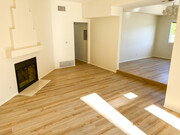 Large, sunny living room with fireplace - 10626 Valley Spring Ln Condo Unit 304