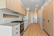 1 BR, 1.5 BA - 815SF - Archer Apartments