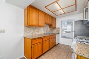 1BR, 1BA - 700SF - Kitchen - 14950 Burbank Blvd