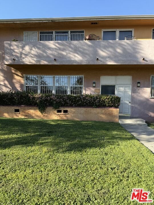 Building Photo - 3311 1/2 W 78th St Unit 112