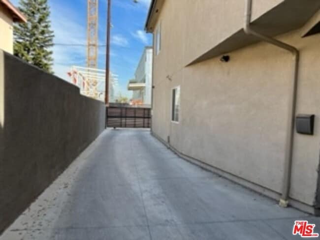 Photo - 6831 1/2-6831 1/2 Hinds Ave