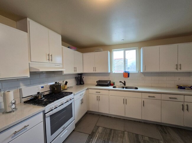 Photo - All Bed& Bath at 1st ,2 car Assigned Parking Space at back with access alley,tile &laminate floor...