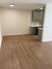 Standing in living room looking toward kitchen. - 1137 12th St Unit #9.    2 bedroom plus den