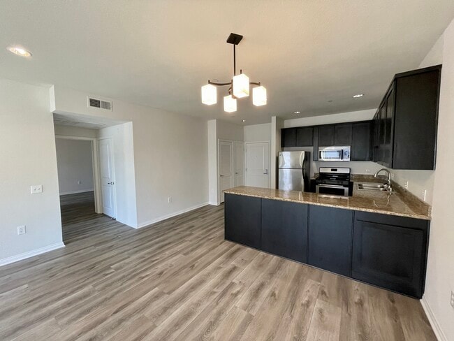 Building Photo - 5827 Carlton Way Unit 302