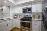Kitchen with Stainless-Steel Appliances - Rose Flower by Wiseman Apartments