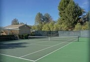 Photo - Located on a cul-de-sac, within the gated ... House