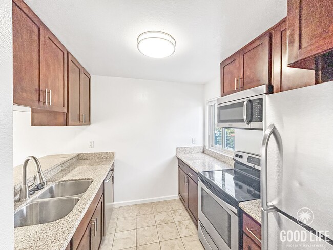 Photo - Bright 2BR Condo with New Carpet, Private Balcony & Great Amenities in Clairemont Mesa! Unit L