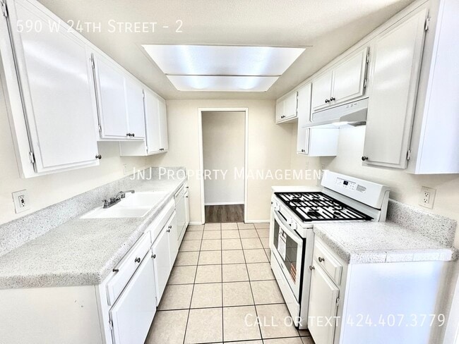 Photo - 590 W 24th St Apartment Unit 2