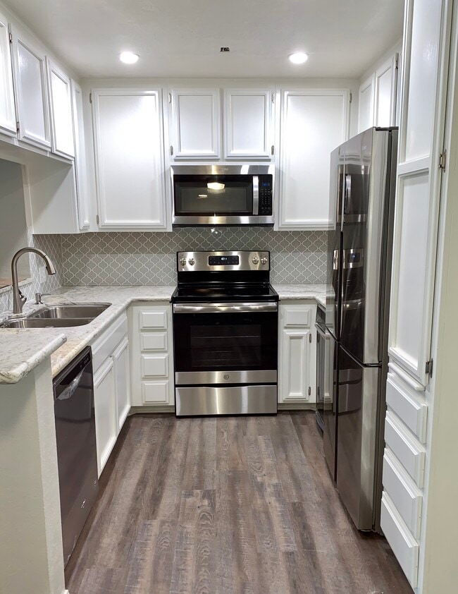 Kitchen from dining space - 5665 Friars Rd Unit 226
