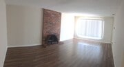Fireplace - 16822 Lynn Lane Apartments Unit A
