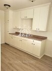 Photo - Spacious Upstairs 2-Bedroom, 1-Bathroom Ap... House