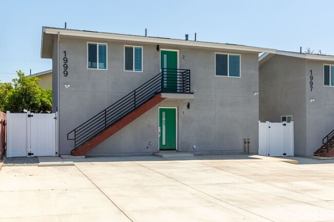 Building Photo - CHARMING Newly Constructed 1BD/BA Availabl...