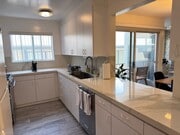 KITCHEN LARGE LOOK THROUGH TO LIVING AREA - Large Bright Front Remolded 2x2 Unit