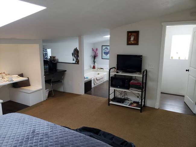 Photo - 37711 E Benton Rd Unit Master Bedroom and shared kitchen